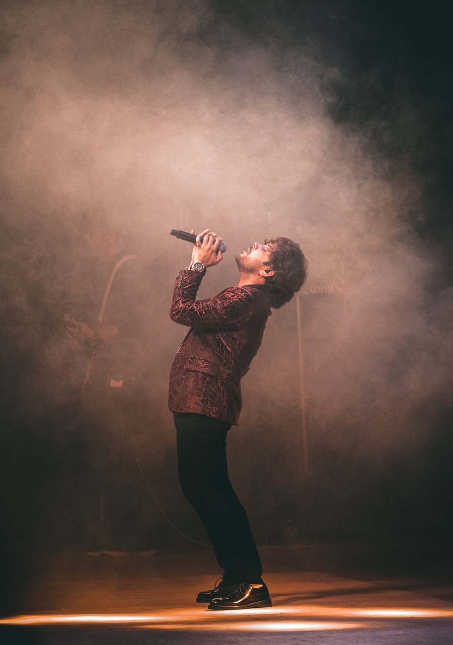 man, singer, singing, voice, vocal, performance, smoke, lights, stage, music, live, show, singer, singer, singer, singer, singer, singing, singing, singing, stage, music